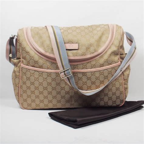 pre owned gucci diaper bag.